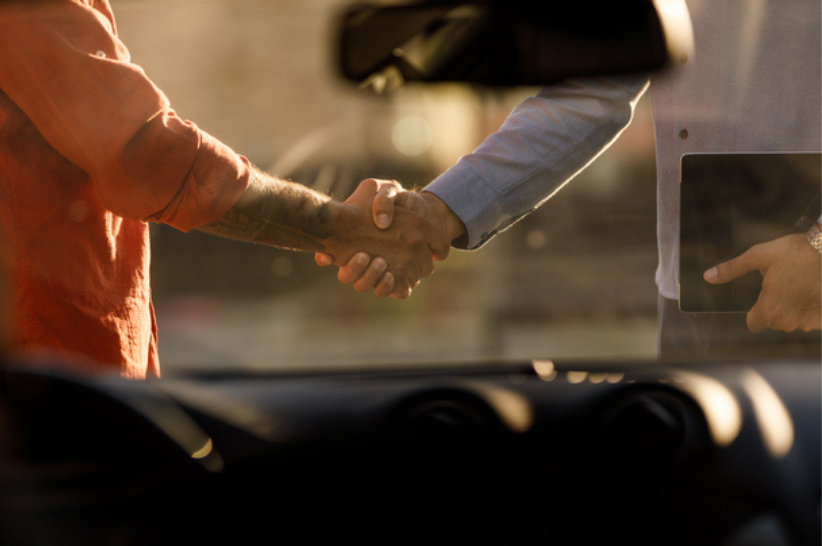 two men shaking hands